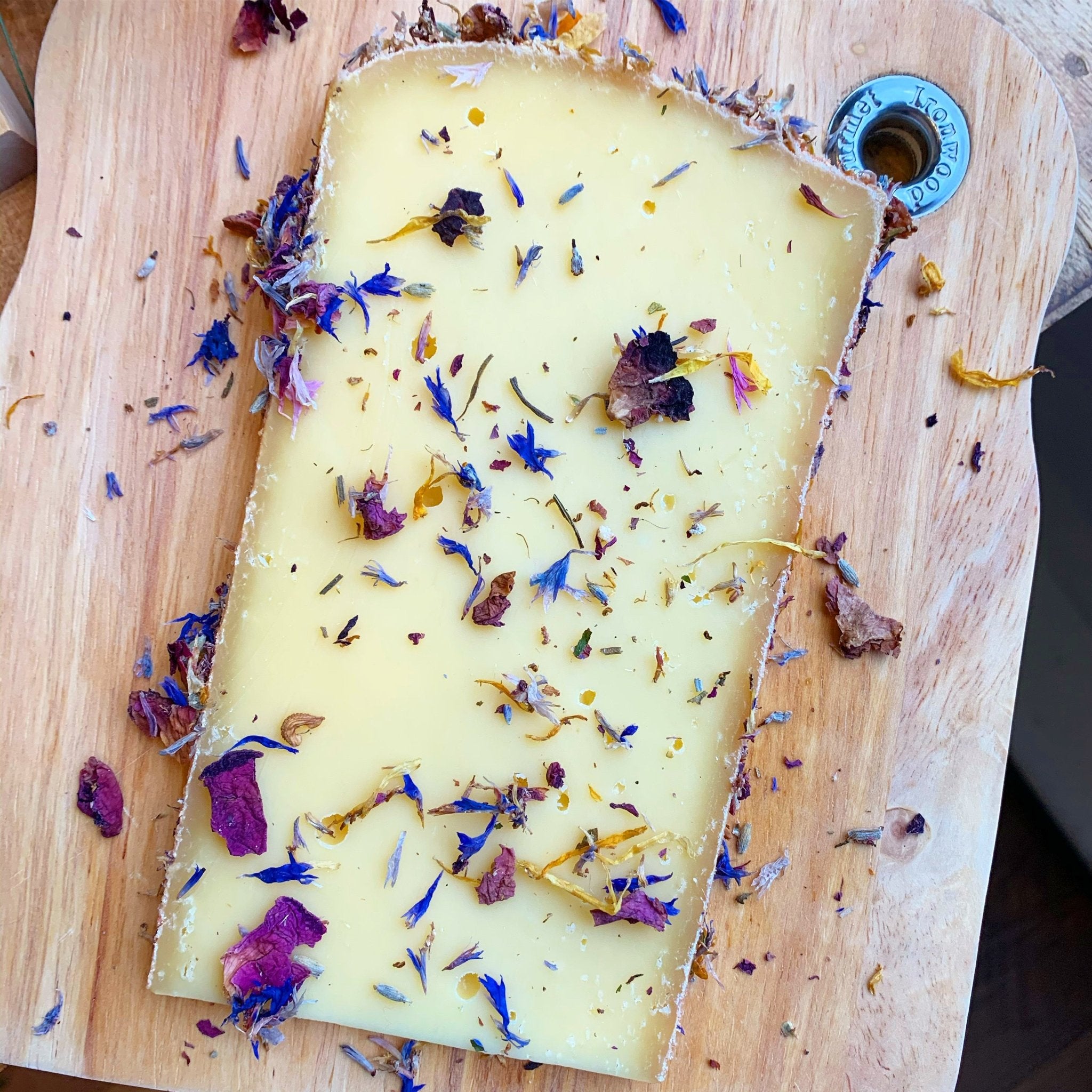 Alp Blossom cheese with a wildflower-coated rind.